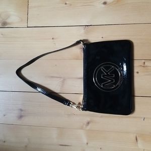 - - - - Like new Michael Kors wristlet